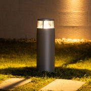 Warm LED bollard lighting creating inviting atmosphere along residential outdoor pathway