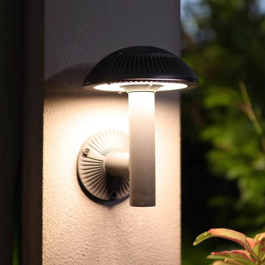 Illuminated pathway lights creating warm glow along garden walkway in evening setting