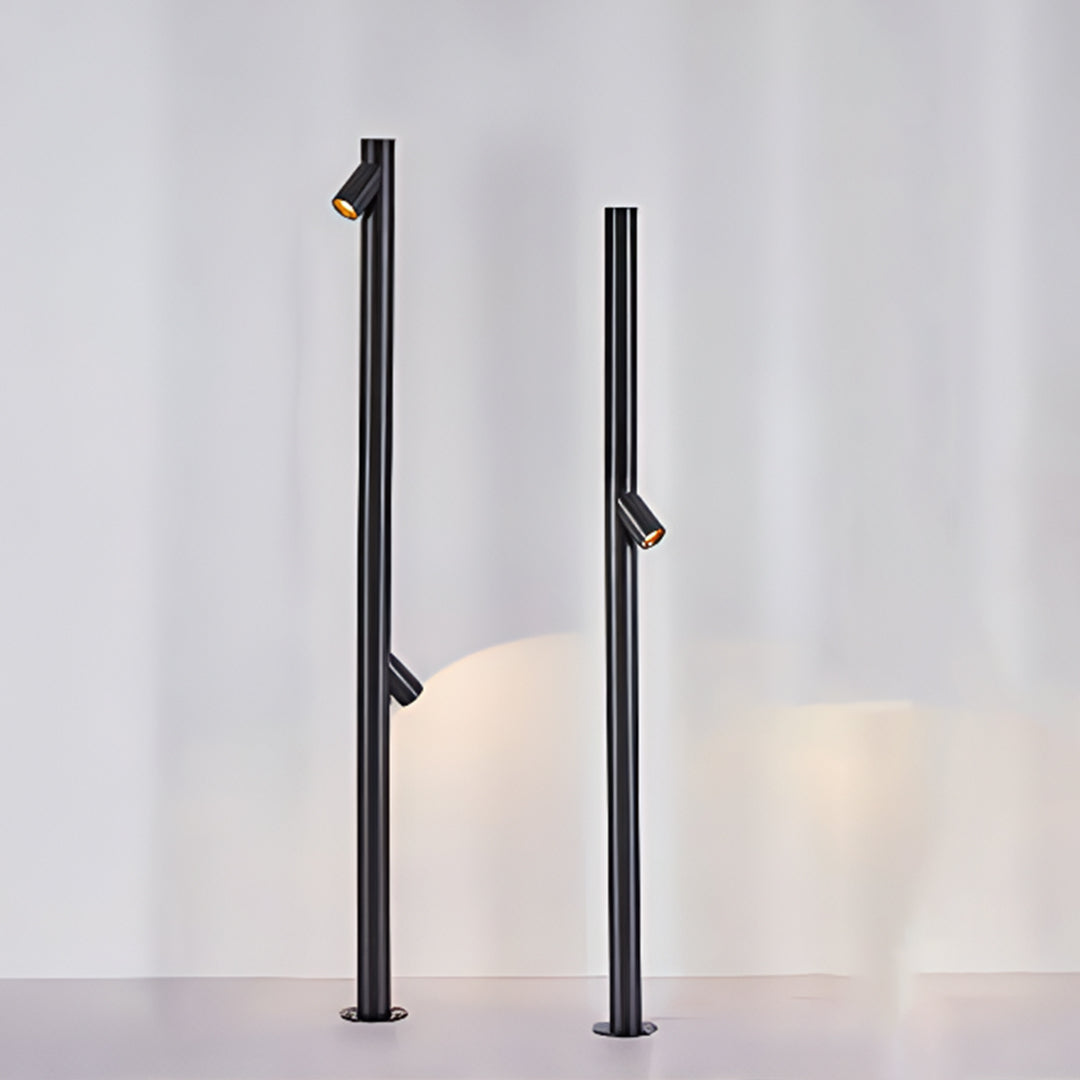 Close-up of LED path light demonstrating warm white illumination output against neutral background