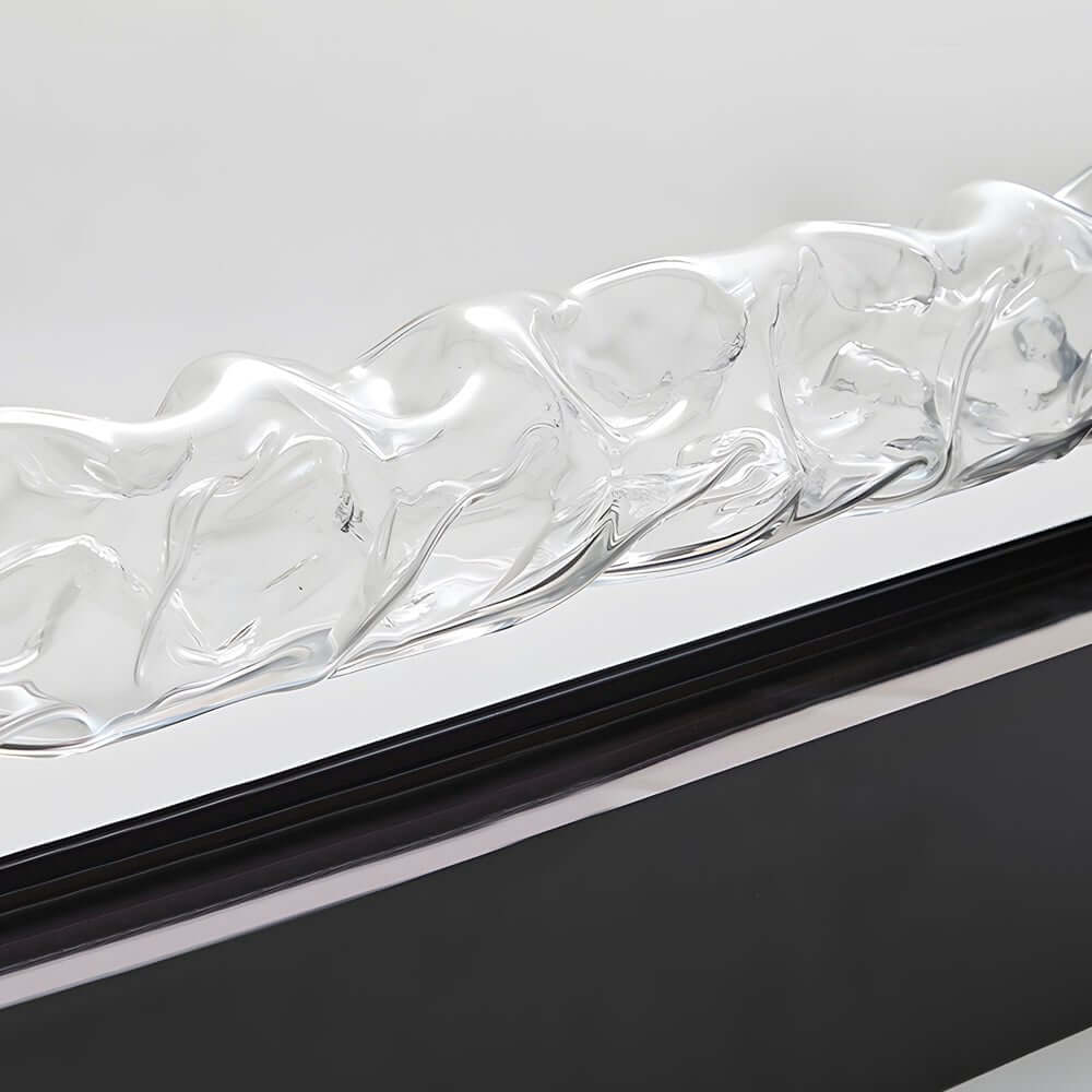 Water pattern lamp with a sleek design, illuminating a modern living space.