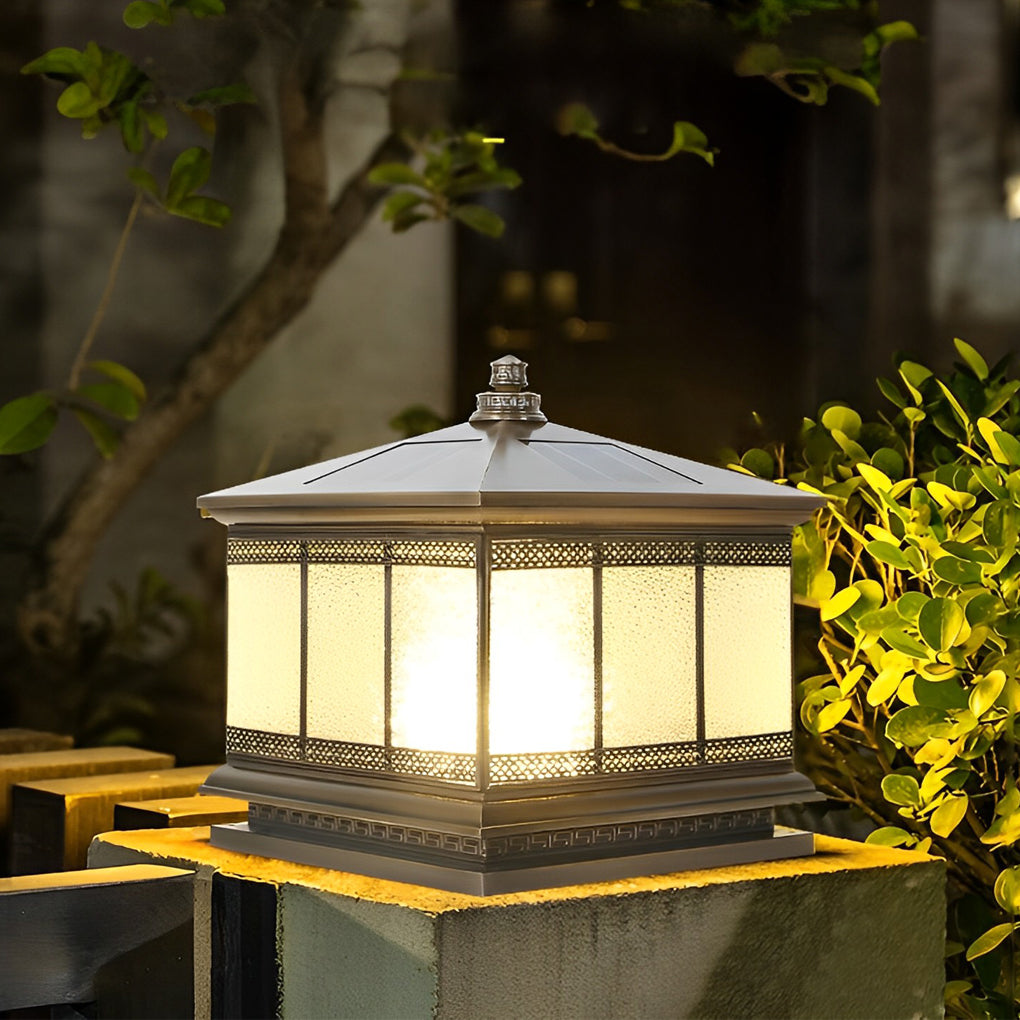 Waterproof outdoor gate pillar light placed on a low wall for pathway and entry lighting.