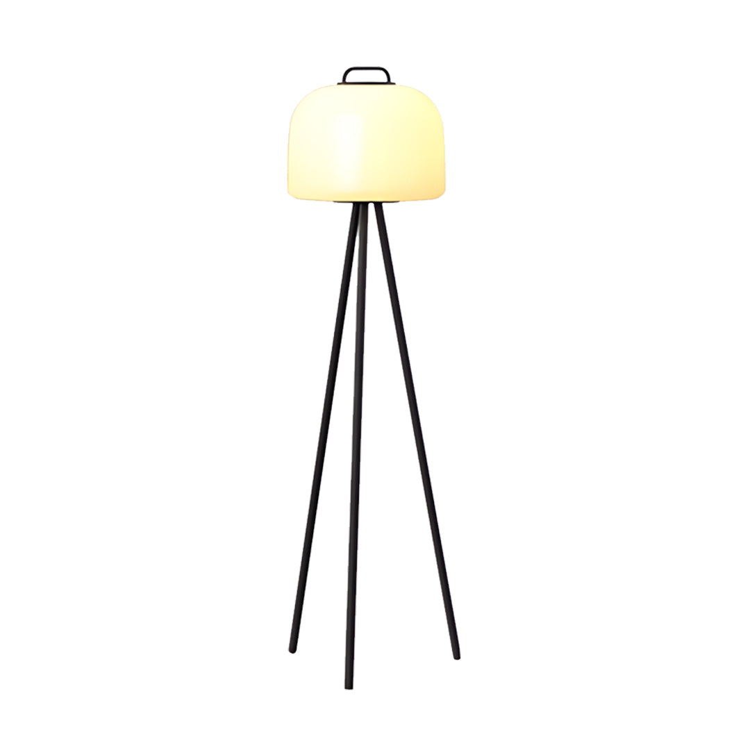 Tall tripod-style waterproof outdoor floor lamps with warm illumination on simple white backdrop.