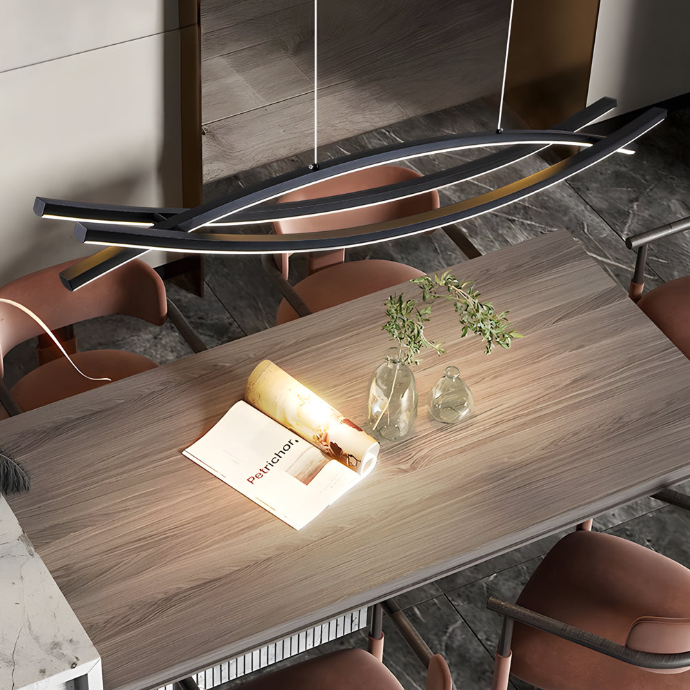 Top view of wave hanging light above a rectangular dining table
