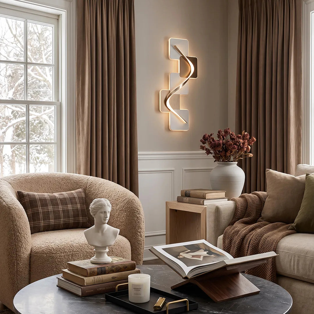 Wave pattern wall sconce mounted beside a window in a cozy living room with armchairs, a coffee table, and warm neutral tones.