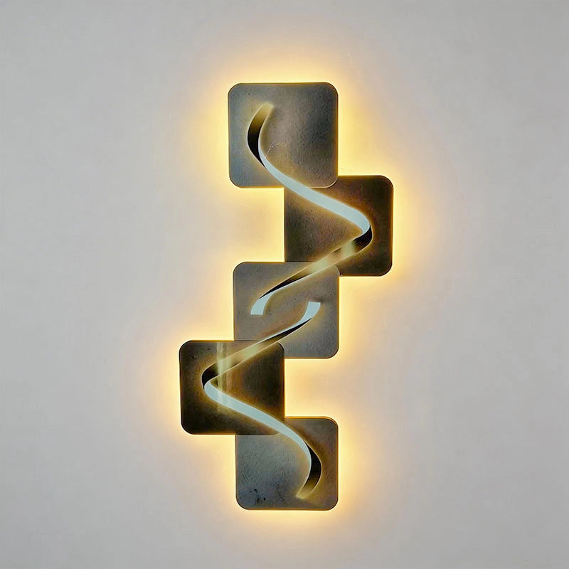 Wave pattern wall sconce glowing against a dark wall, featuring stacked geometric panels and warm ambient backlighting.