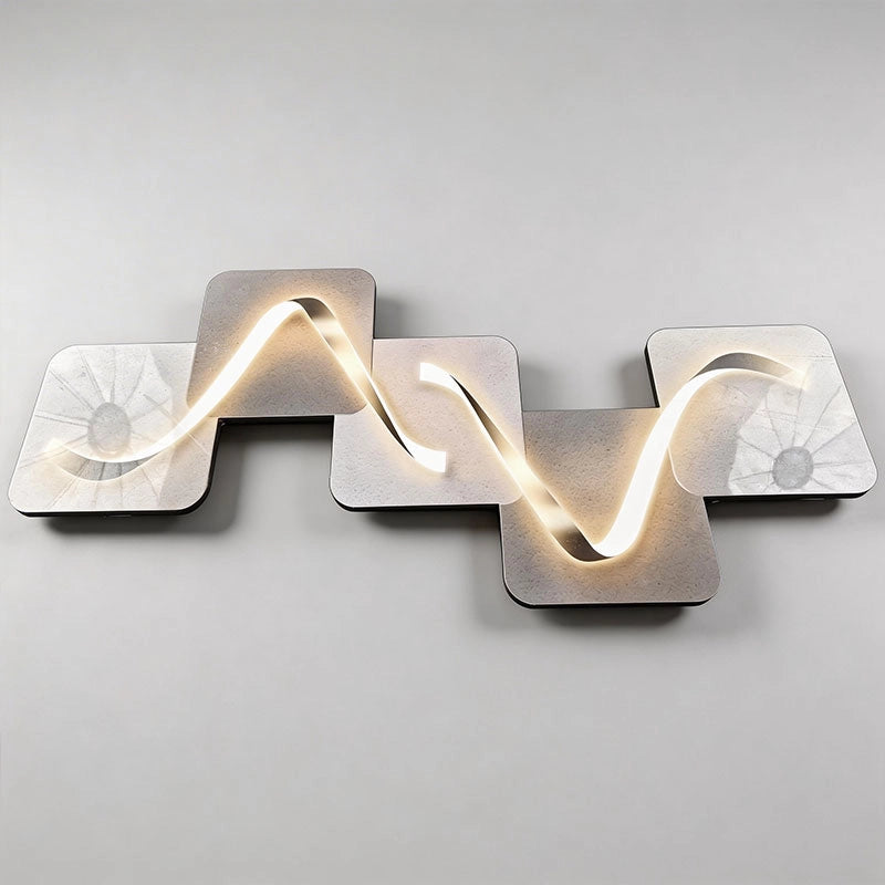 Wave pattern wall sconce shown in a horizontal product view with a soft flowing LED ribbon across multiple square panels.