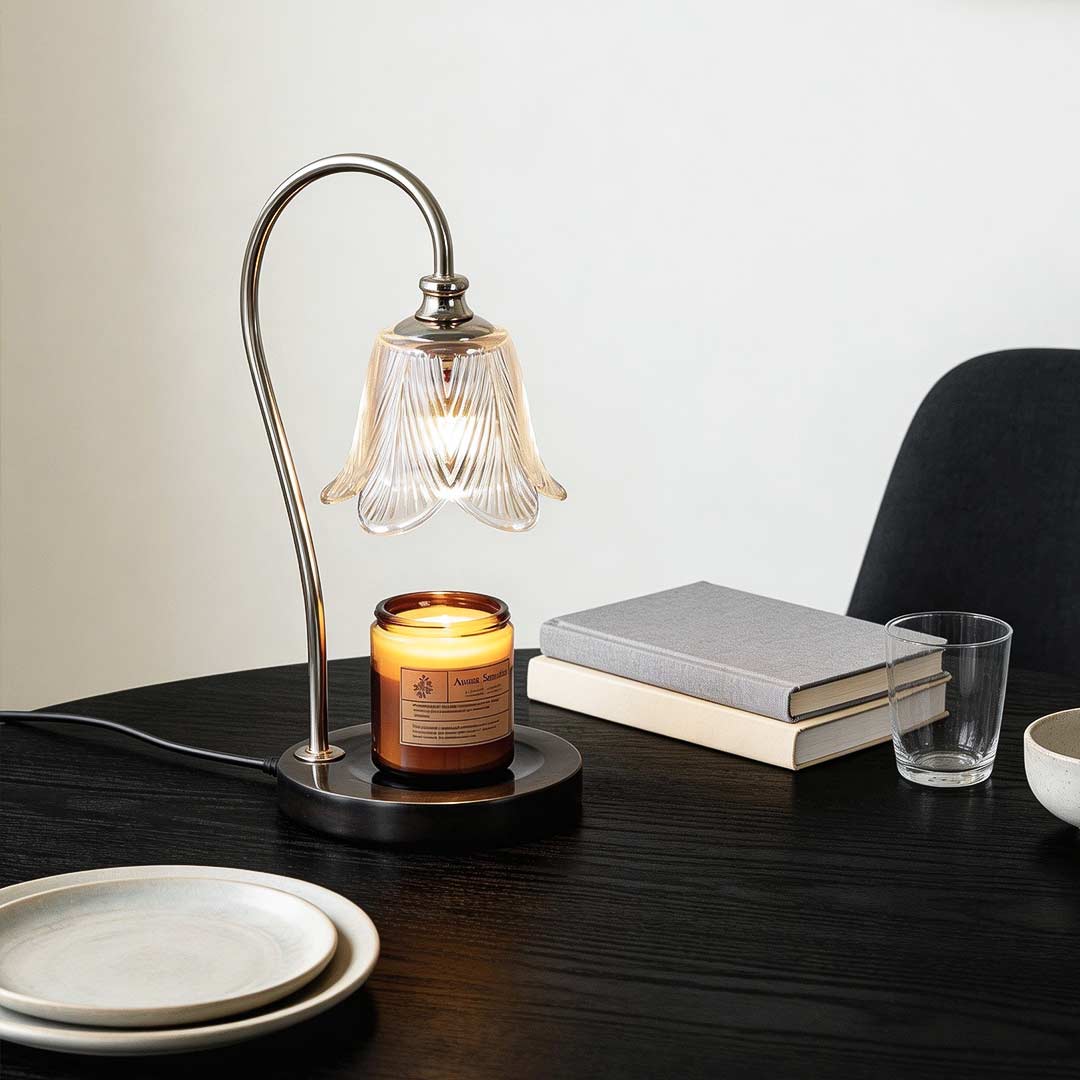 Wax melt light with elegant glass shade illuminating a cozy home office desk.