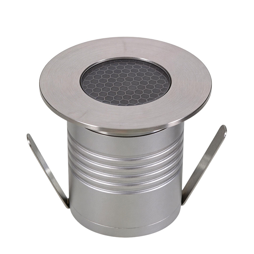 Well lights in concrete with a modern design, providing ambient lighting.