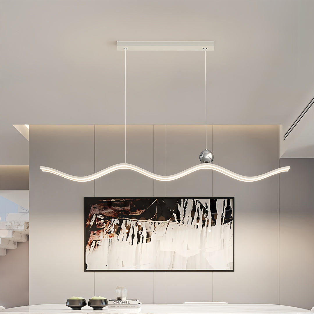 White and black modern wave chandelier featuring a central crystal sphere accent in a contemporary space.