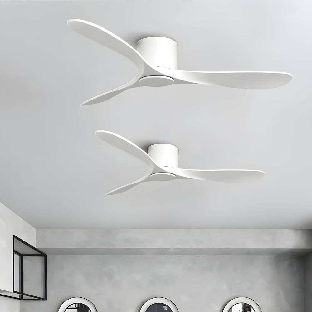 White ceiling fan with a sleek design, displayed against a white ceiling.