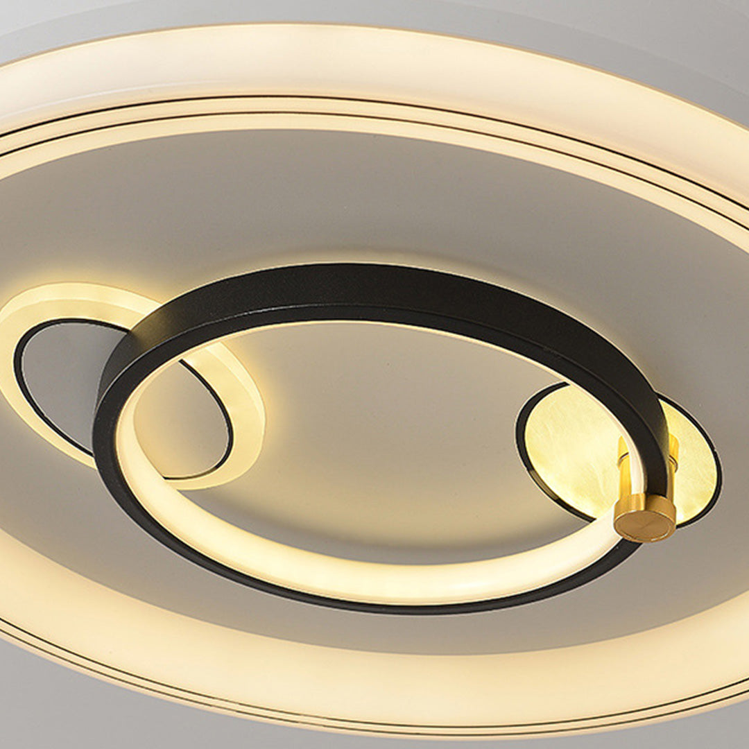 Close-up detail of white ceiling fans with light showing premium LED ring construction