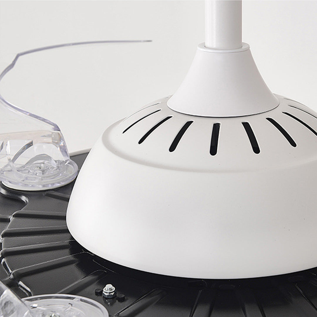 Underside view of white ceiling fans with light revealing motor housing and ventilation design