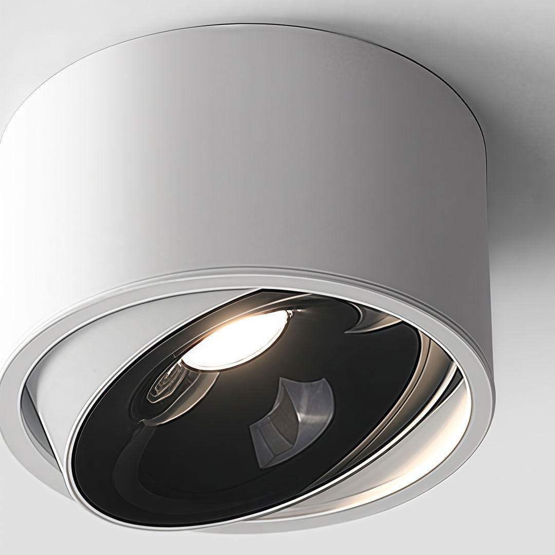 White ceiling spotlight with clean lines and soft illumination for modern interiors.