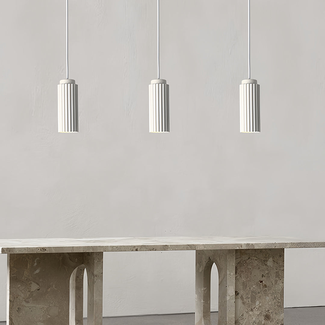 White metal pendants light arranged in modern dining space with pendant aesthetics