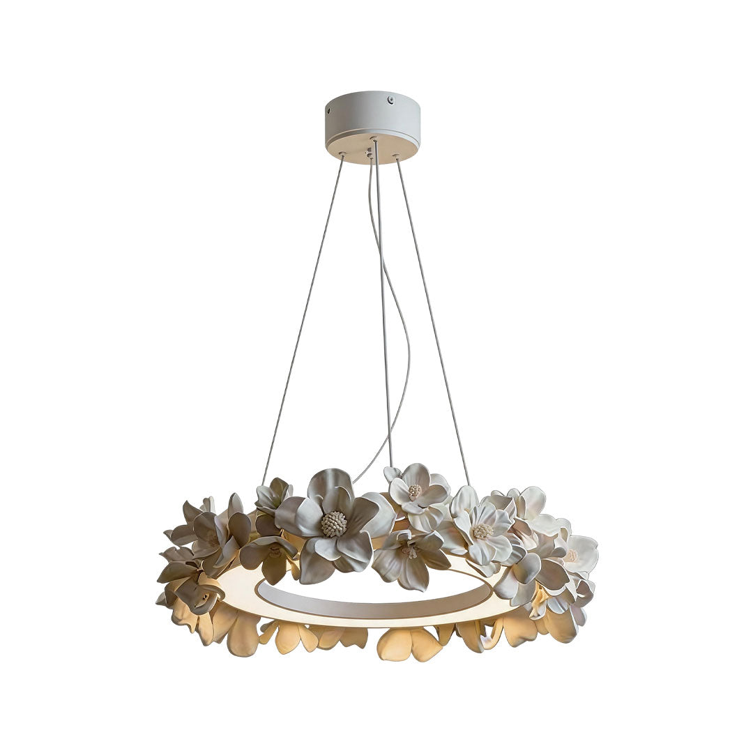 White dining room chandelier with a single circular ring, floral accents, and soft integrated lighting.