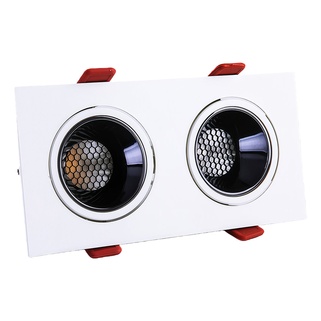 White dual-light rectangular fixture featuring two square recessed downlight modules with honeycomb grilles.