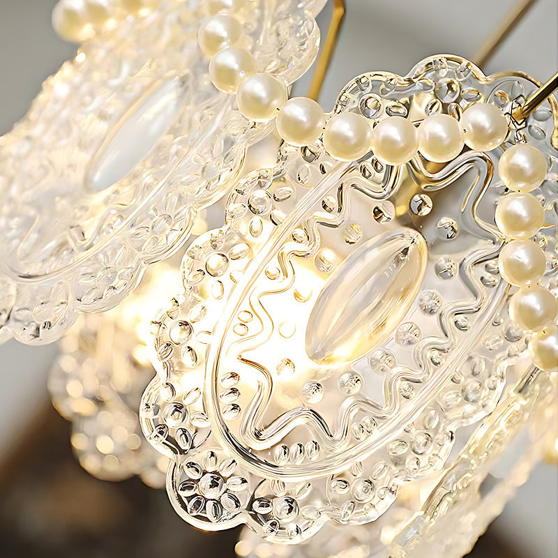 White glass pendant lights with a classic design, illuminating a modern dining space.