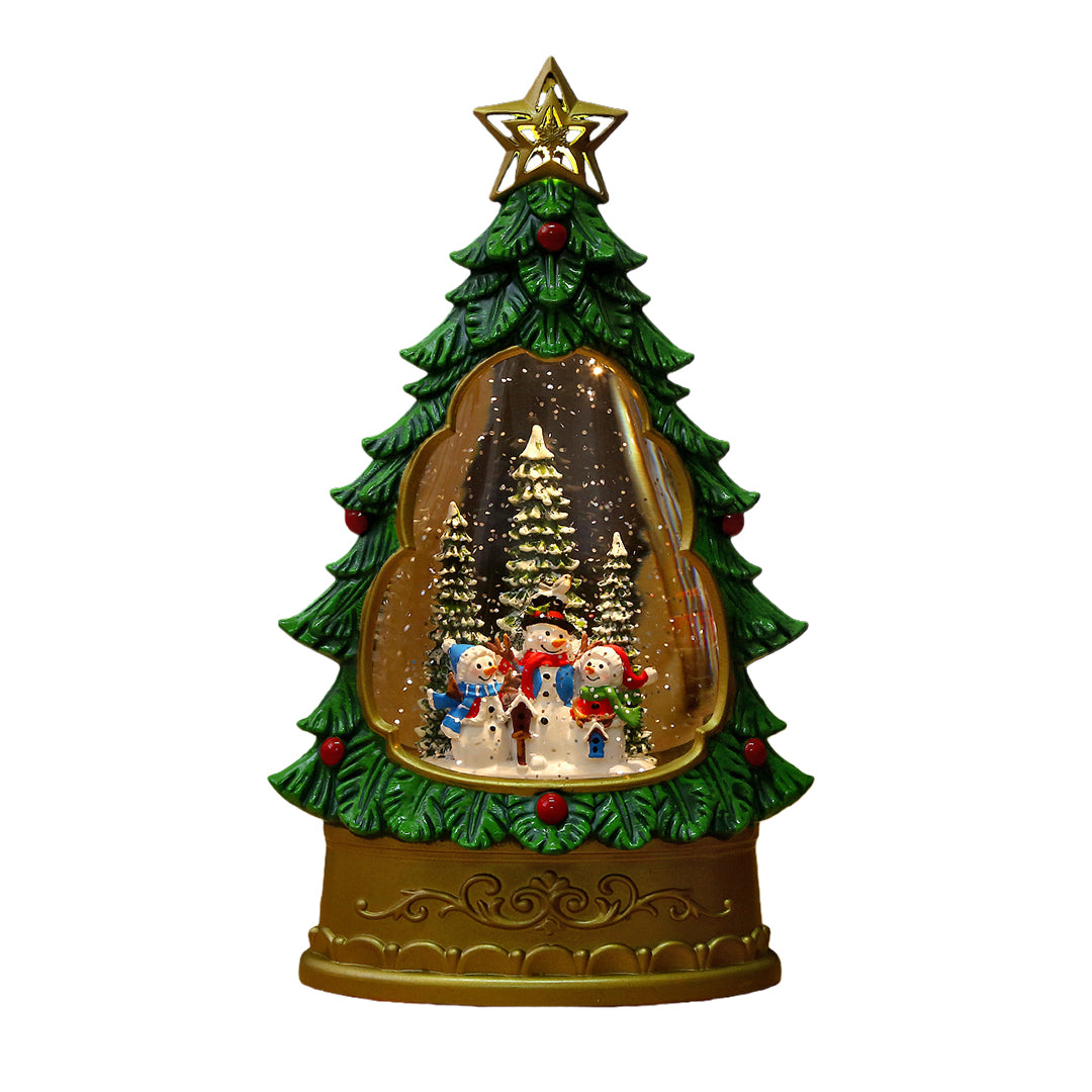 White glass table lamp featuring frosted cloche with lit Christmas tree miniature on natural wood base