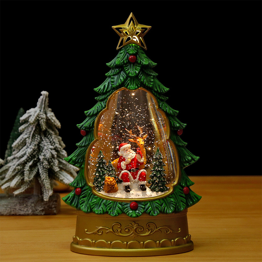 White glass table lamp group with golden tree accents and frosted covers creating festive tabletop arrangement