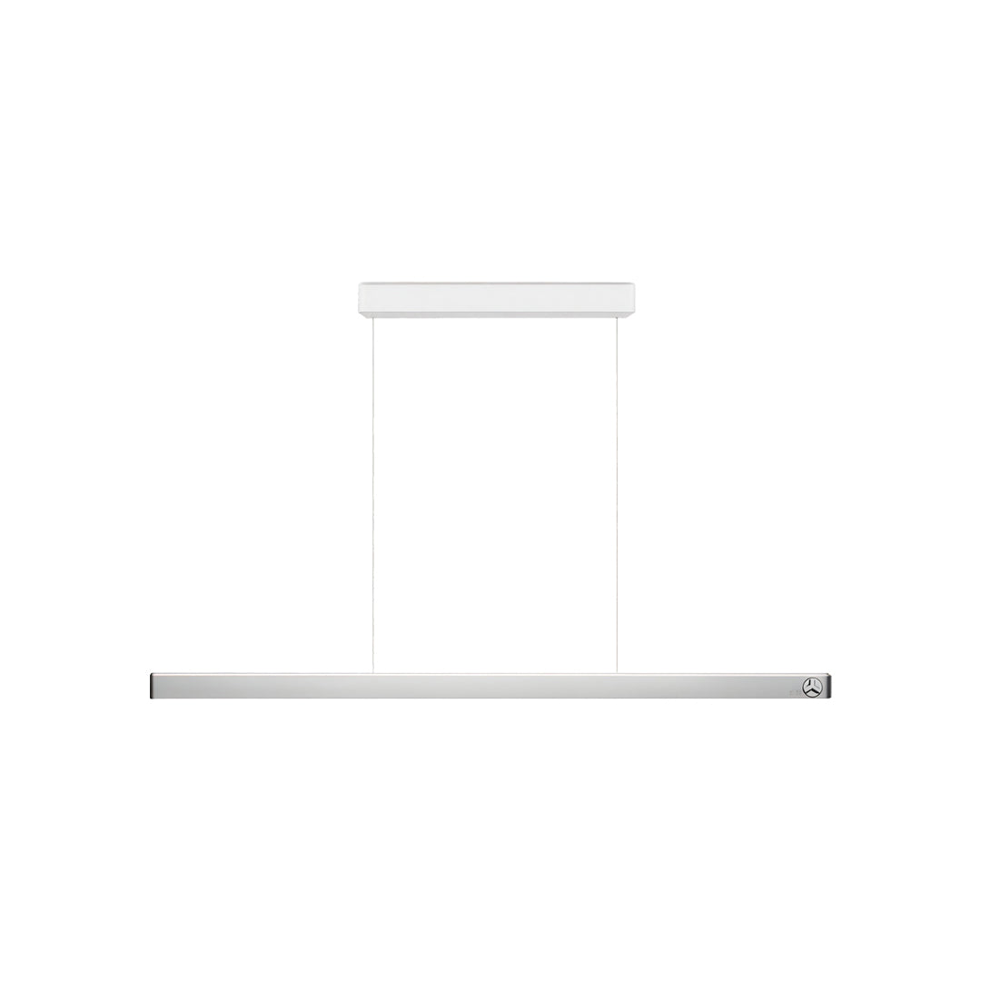 White linear suspension lighting fixtures with slim rectangular profile suspended by adjustable cables.