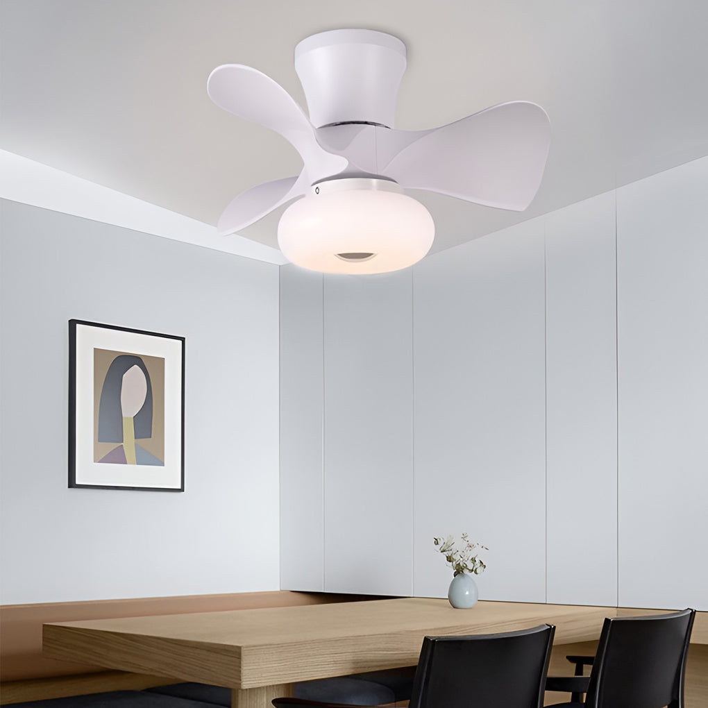 White macaron ceiling fan with light above minimalist dining table.