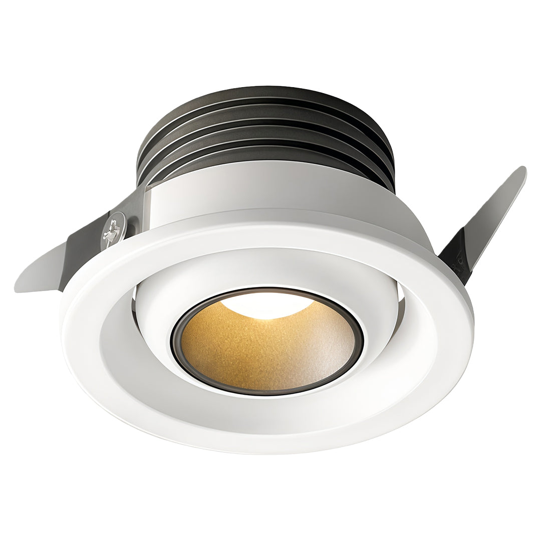 White mini LED spotlight with round trim and warm amber center for recessed ceiling installation