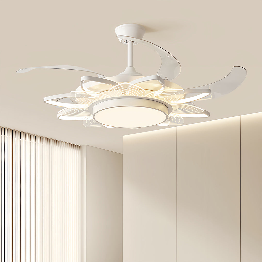 White modern ceiling fan with light brightening serene bedroom with neutral palette and sheer curtains