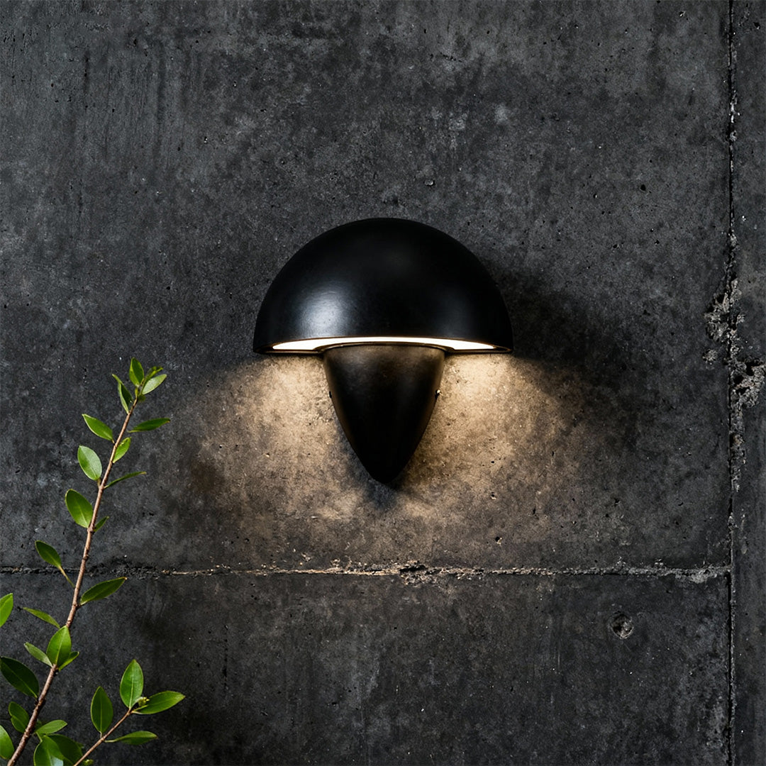 Soft white mushroom wall light installed in an entryway, creating a welcoming atmosphere with its gentle glow.