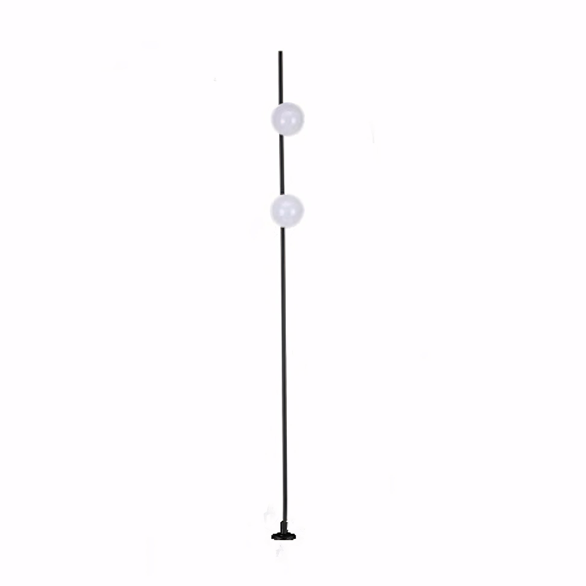 Sleek white pole light with spherical shade providing clean modern pathway illumination