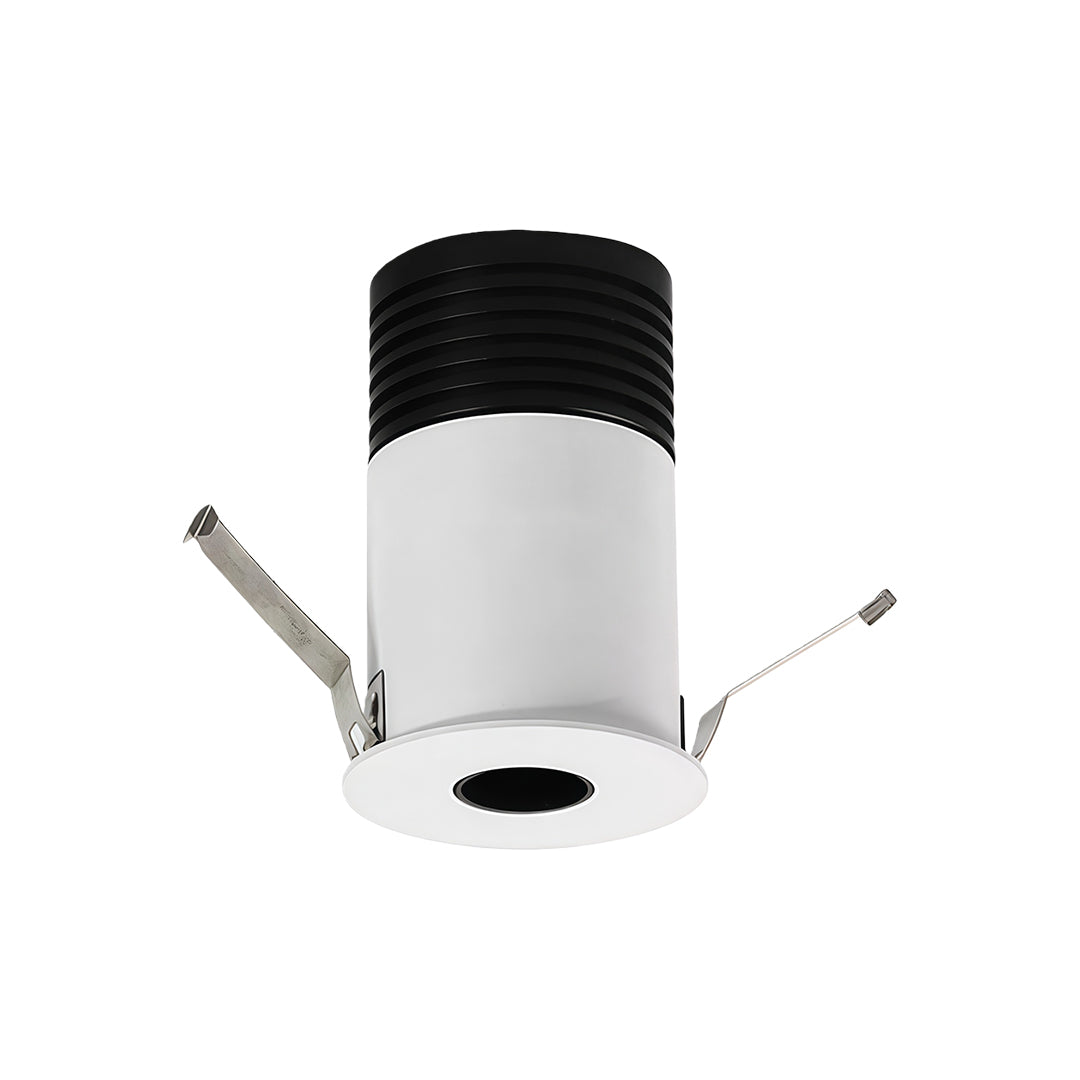 Recessed LED ceiling light with white cylindrical housing and black heat sink with adjustable mounting clips
