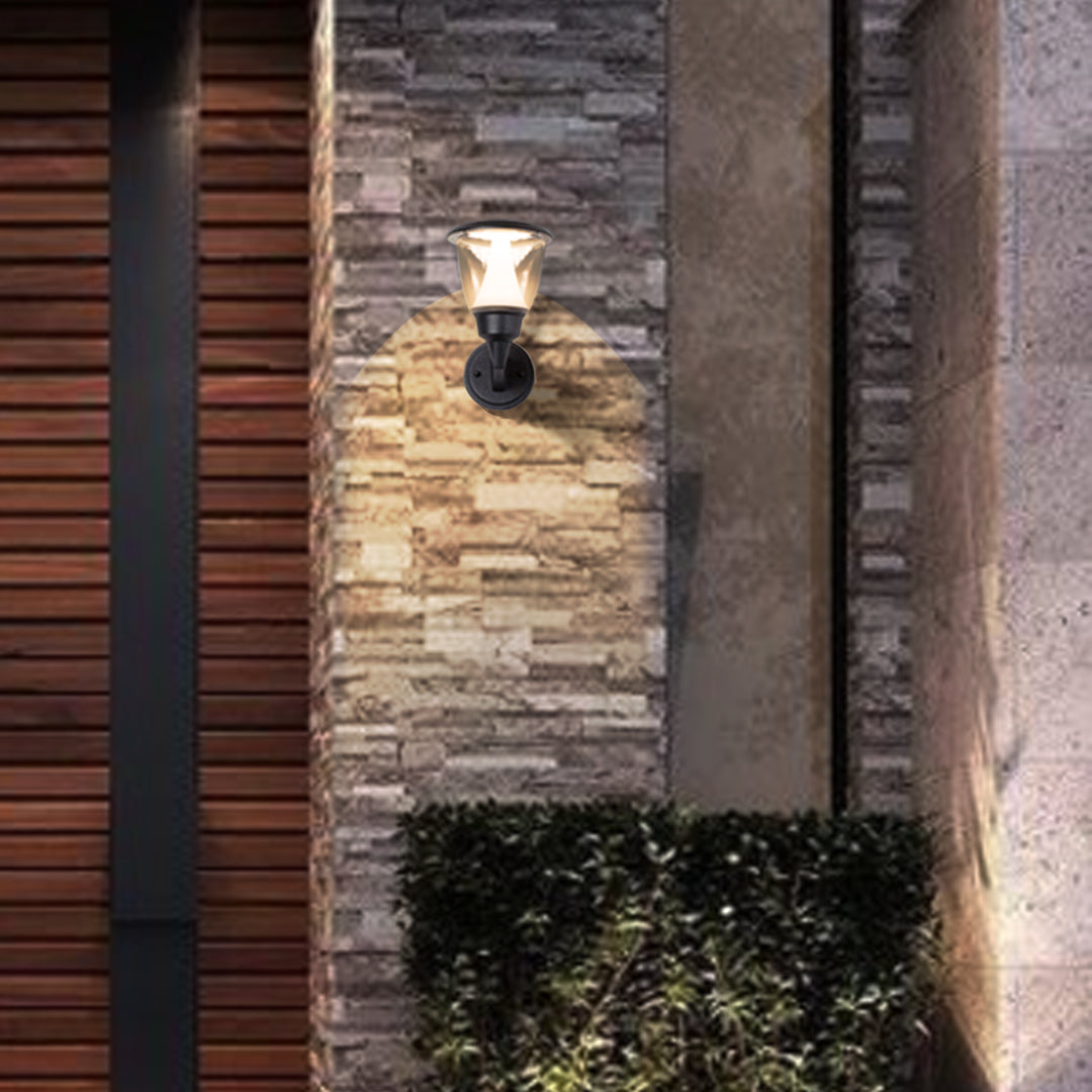 Warm LED wall light illuminating textured brick surface creating dramatic architectural lighting effects