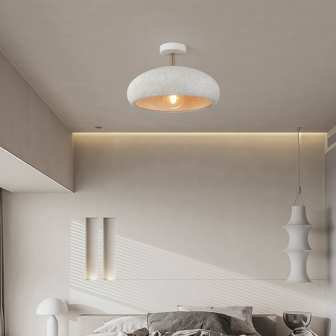 White semi flush ceiling lights mounted in a living room, adding a contemporary touch to the space.