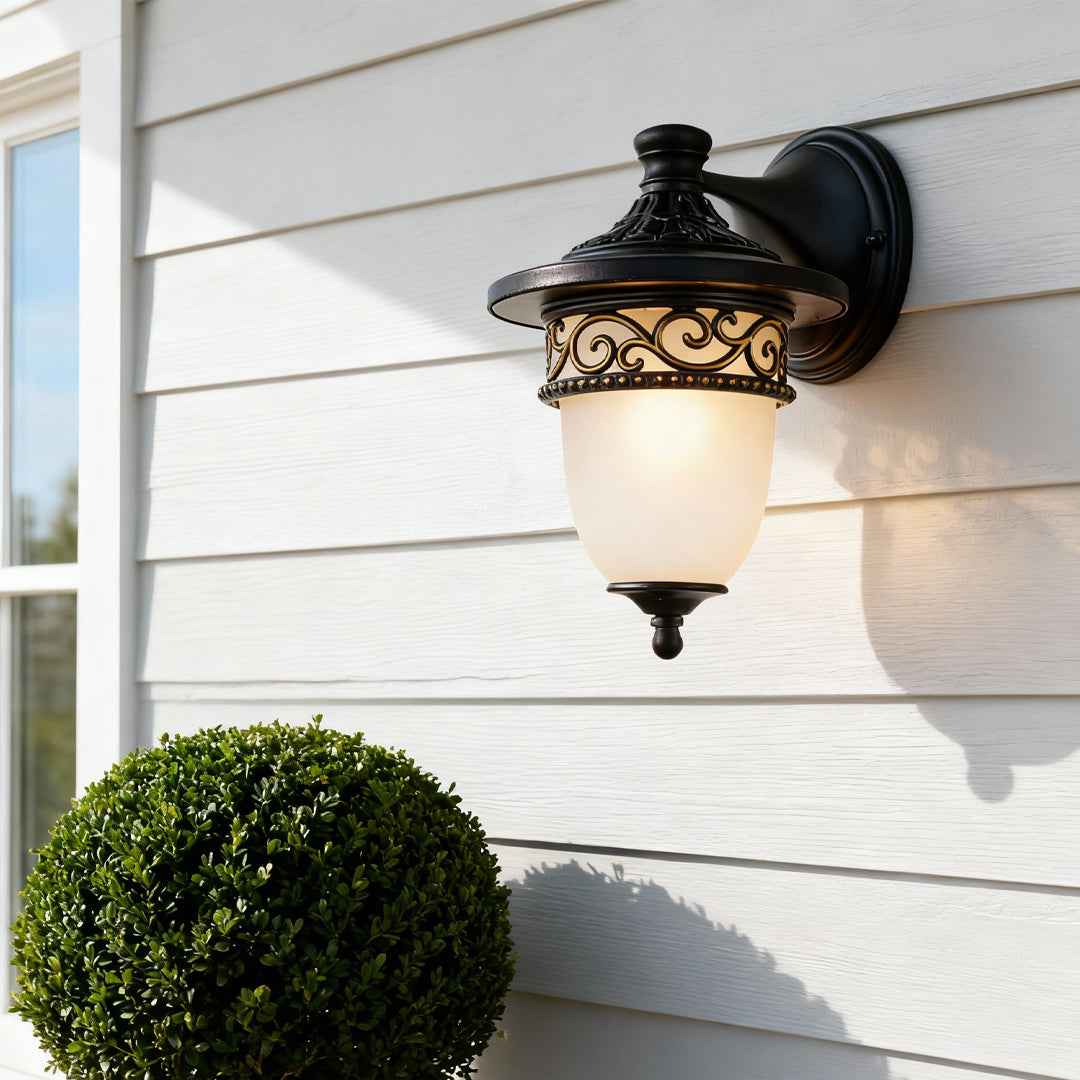 Vintage wall lights outdoor mounted on white siding with soft evening illumination.