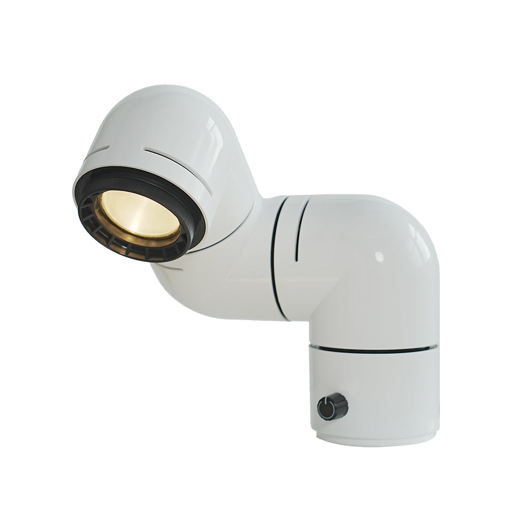 White statement table lamps with sleek curves and matte finish, perfect for minimalist desks.