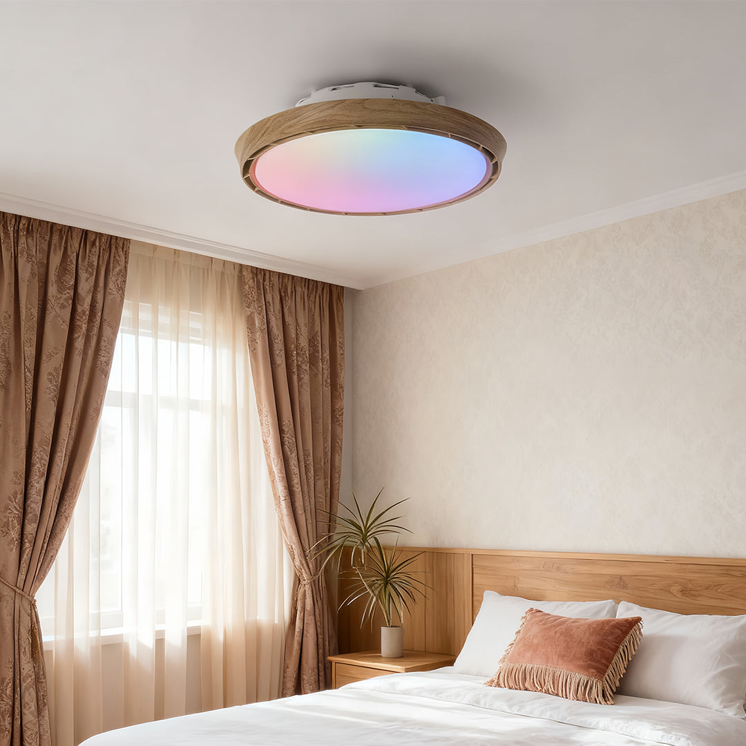 Modern ceiling fan with light in a white-themed room, sleek and functional indoor lighting