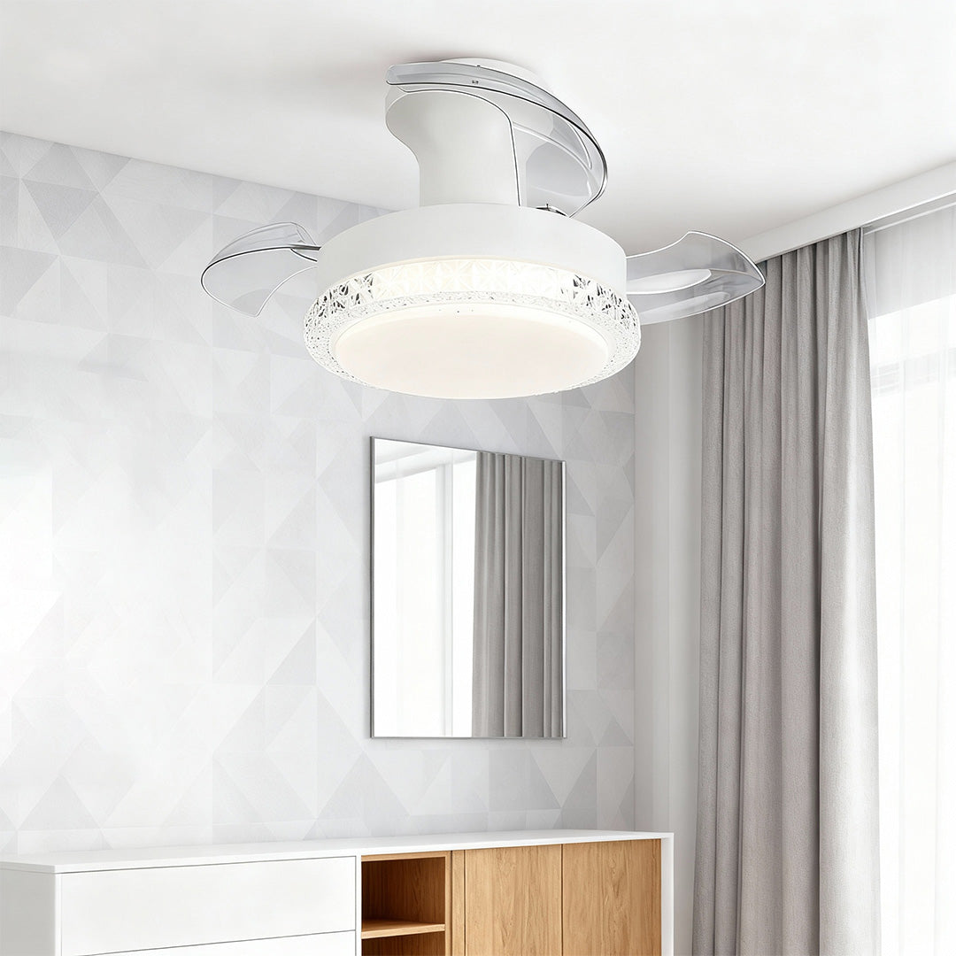 White three blade ceiling fan with light brightening minimalist bedroom with grey curtains and natural light.