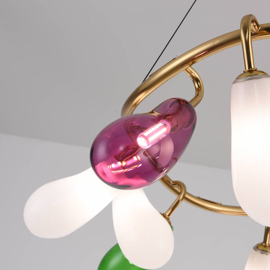 Wide linear chandelier with multiple glass bulbs evenly spaced along a gold frame.