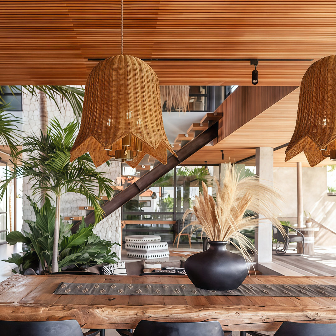 Hanging rattan pendant light with a wide shade, providing bright yet soft lighting for larger spaces.