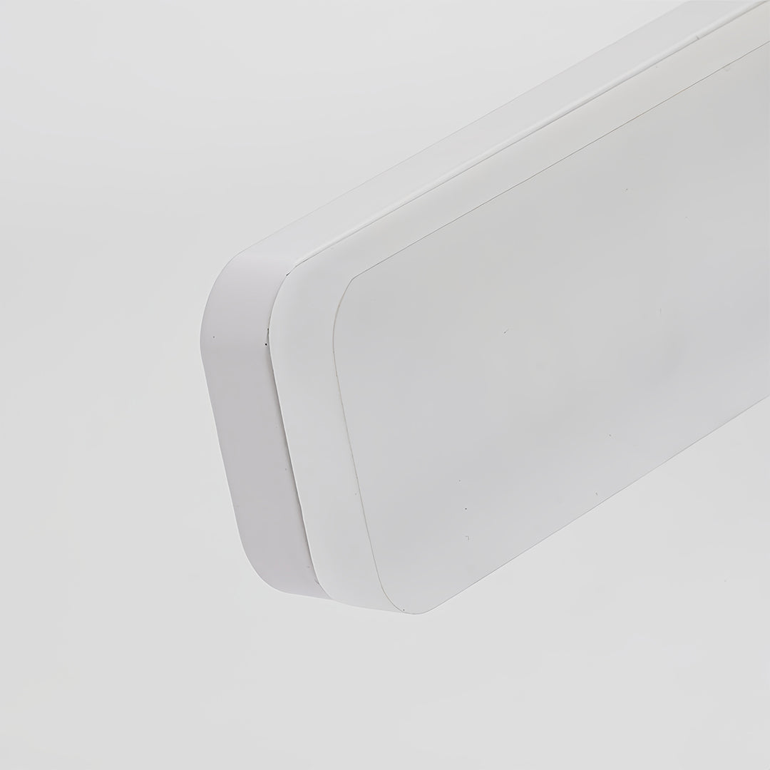 Small black pendant light illuminating bathroom window area with natural lighting integration