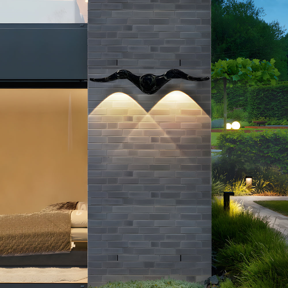 Modern two light outdoor wall sconce with wooden accent elements for warm exterior lighting