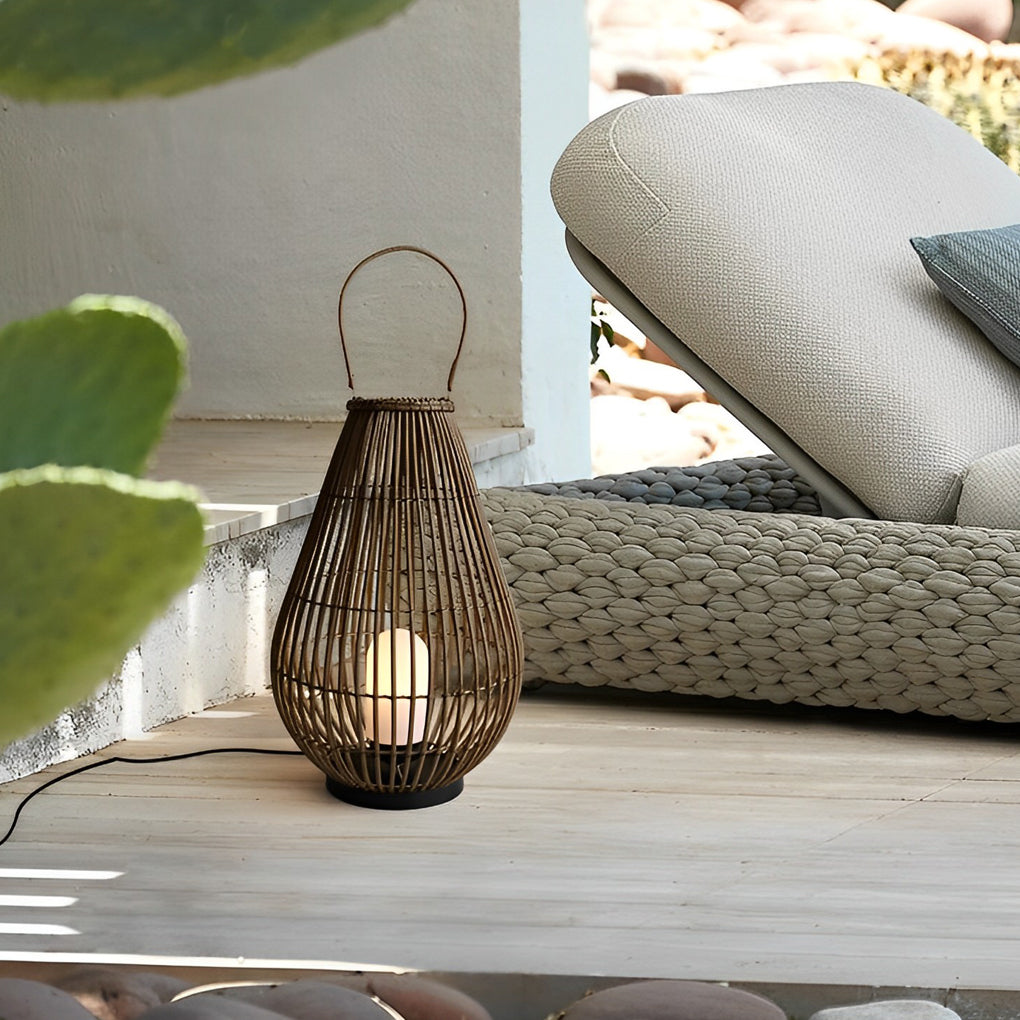 Woven bamboo lantern with a pair of lanterns, enhancing a cozy patio setting.