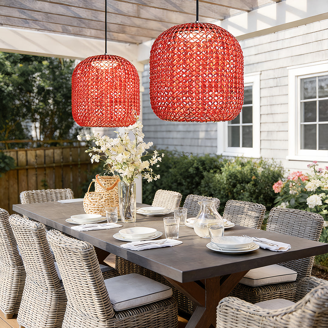 Woven hanging lantern with a close-up of its intricate red woven pattern and glowing light.
