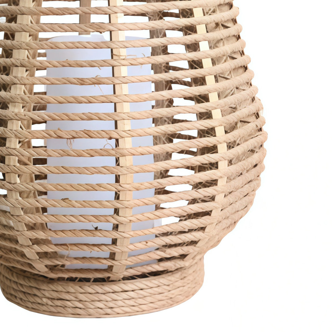 Detailed view of woven rattan solar lantern body highlighting craftsmanship.