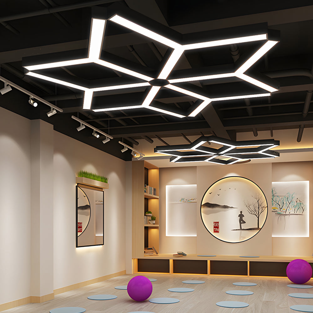 Y shape linear LED lights installed in a creative commercial ceiling