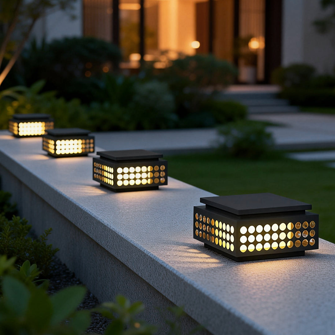Zen garden light providing soft illumination along a garden pathway with greenery.
