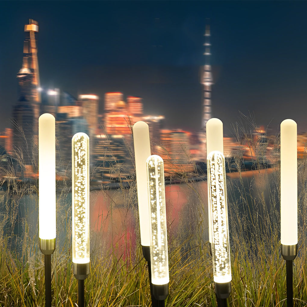 Acrylic bubble landscape light illuminating a minimalist outdoor area with focused glow.