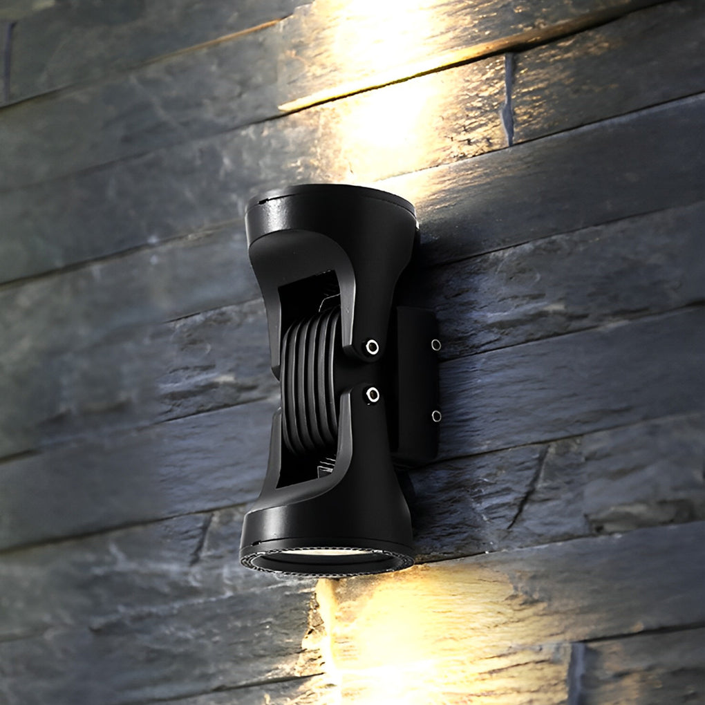 Adjustable outdoor wall light providing elegant illumination for a contemporary patio.