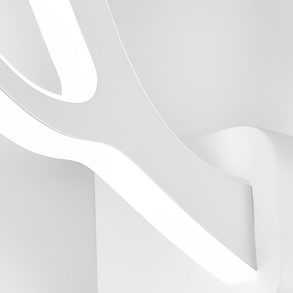 Antler wall sconce light close-up highlighting the smooth antler arm shape and integrated LED light strip.