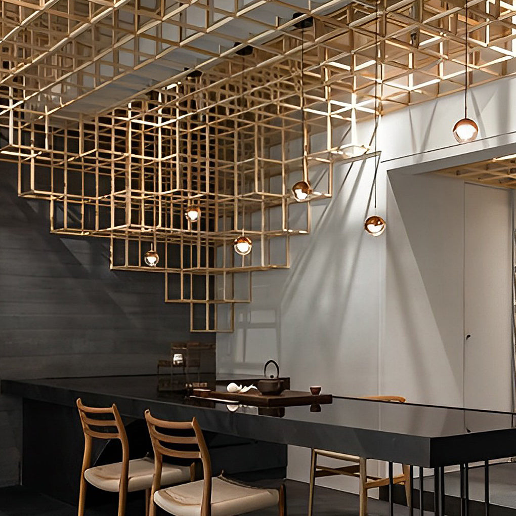 Luxury copper globe pendant light set in a grand architectural space with a gold grid ceiling.