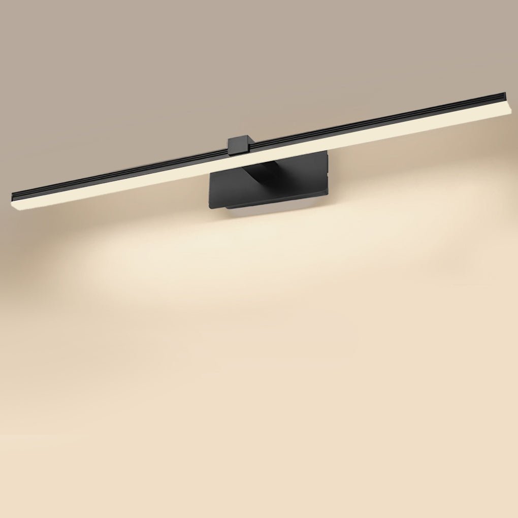 Soft ambient glow created by slim bathroom lights above vanity on beige wall.